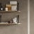Textured wall with open shelves