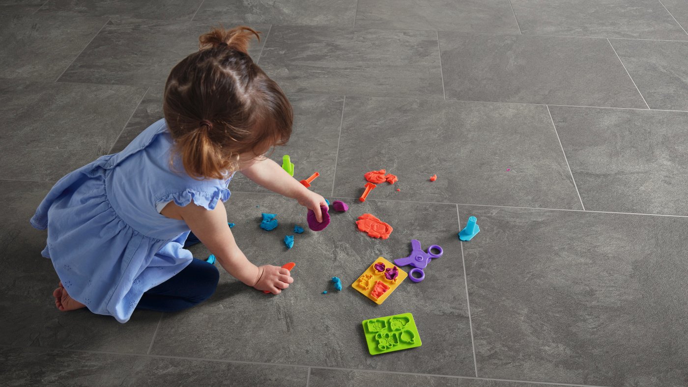 Little girl playing on a Volcanic Slate RKT3001-G floor
